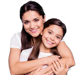 woman and young girl hugging and smiling