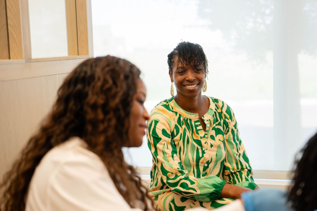 Dr. Lauris Johnson talking with a parent at MyFamily Orthodontics